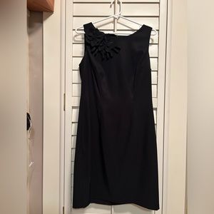 A must have little black dress, wrinkle free, 2 flower on right side
